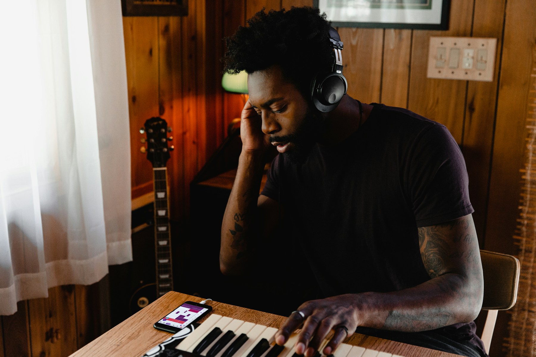 Music producer working in a studio